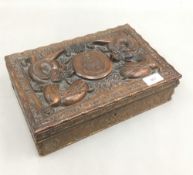 An early 20th century carved wooden box,