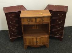 A pair of modern bedside drawers and a side cabinet