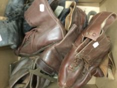 A quantity of vintage leather ice skates