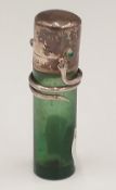 A silver mounted green glass scent bottle,