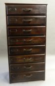 An early 20th century oak bank of drawers