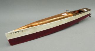 A 1930s speedboat toy. 73 cm long.