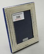 A small silver photo frame