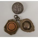 Two silver fobs and a Victorian brooch