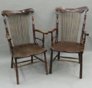 A pair of 19th century mahogany stick back open armchairs