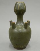 A Chinese pottery crocus vase