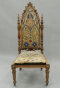 A Victorian tapestry covered rosewood Gothic Revival chair