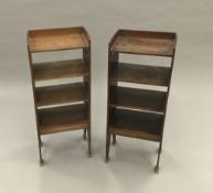 A pair of Arts and Crafts oak bookcases. 82 cm high, 33 cm wide, 23 cm deep.