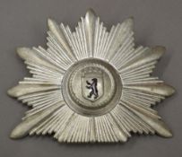 A West German Police cap badge