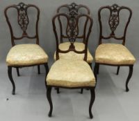 A set of four Edwardian mahogany chairs