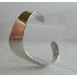 A silver cuff bangle (29.