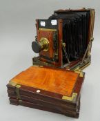 A Moore and Co plate camera with three dark slides