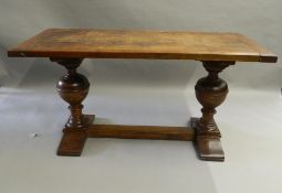 A small early 20th century oak refectory table. 135.5 cm long, 60.5 cm wide, 69 cm high.