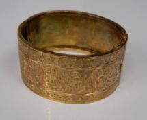 A 9 ct gold cuff bangle (22.