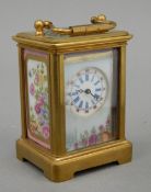 A miniature Sevres style carriage clock