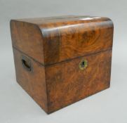A Victorian walnut decanter box