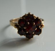 A 9 ct gold garnet set ring (2.