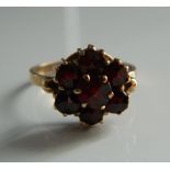 A 9 ct gold garnet set ring (2.