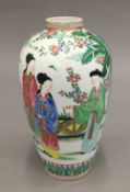 A Chinese porcelain vase decorated with figures