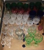 A quantity of cut and coloured drinking glasses