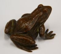 A bronze model of a frog