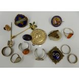 A small quantity of various jewellery, including rings, enamel brooches, etc.