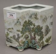 A Chinese porcelain double brush pot. 14 cm high, 6.75 cm wide.