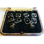 A cased set of studs and cufflinks
