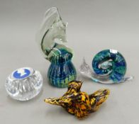 Four various glass paperweights