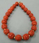 A string of cinnabar beads