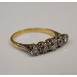 A gold five stone diamond ring (2.