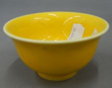 A Chinese yellow porcelain bowl