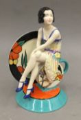 A Kevin Francis porcelain figurine, Young Clarice Cliff Renaissance No.