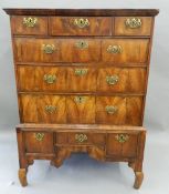 An 18th century walnut chest on stand. 134 cm high, 55 cm deep, 98 cm wide.