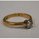 An 18 ct gold diamond solitaire ring (2.