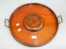 A Victorian mahogany tray. 42 cm diameter excluding handles.