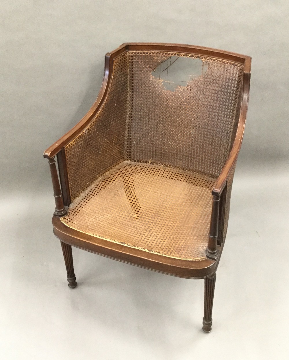An early 20th century mahogany framed bergere chair - Image 4 of 4