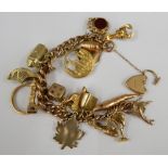 A 9 ct gold charm bracelet (some charms not gold) (70.