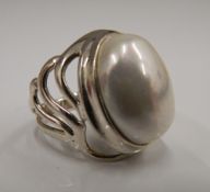 A silver dress ring