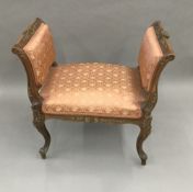 A 19th century upholstered window seat