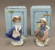 Two boxed Lladro figurines,