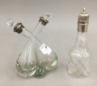 A double clear glass vinaigrette and another