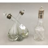 A double clear glass vinaigrette and another