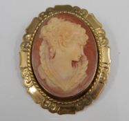 A gold framed cameo brooch