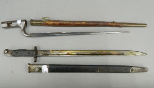 Two bayonets in scabbard