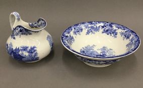 A small Victorian blue and white porcelain jug and bowl