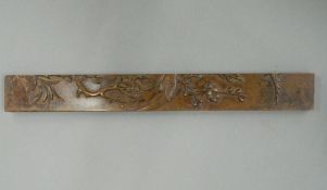 A Chinese bronze scroll weight