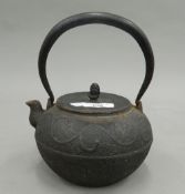 A Japanese cast iron teapot