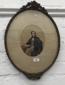 A Victorian gilt framed watercolour of a Bearded Gentleman Reading