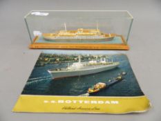 A display model of the SS "Rotterdam" 38645 GRT Flagship of the Holland-America Line with pamphlet